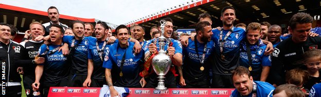 Bournemouth players celebrate with the Championship trophy