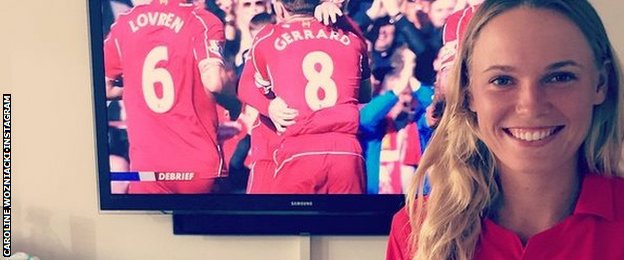 Caroline Wozniacki watches Liverpool on TV