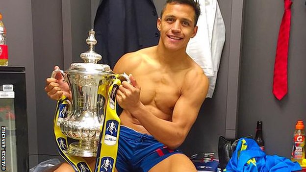 Alexis Sanchez with the FA Cup