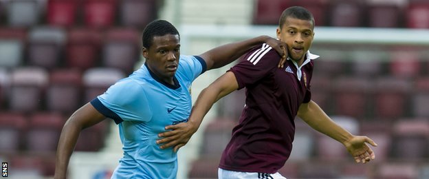 Dedryck Boyata (left) faced Hearts in pre-season in the colours of Manchester City