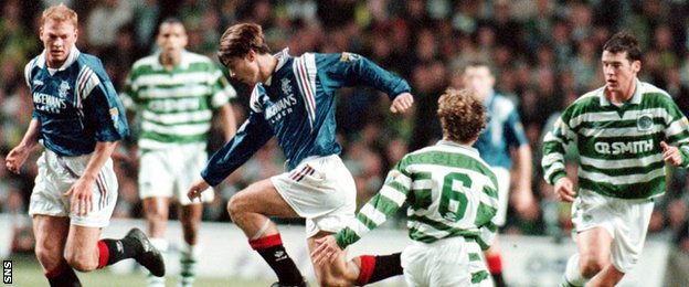 Brian Laudrup in the heat of an Old Firm derby