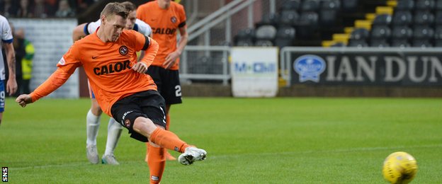 Billy McKay scores a penalty for Dundee United against Kilmarnock