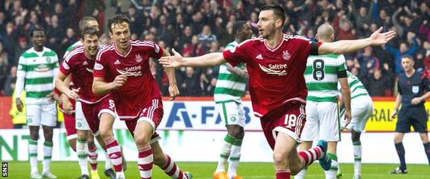 Paul Quinn celebrates his winning goal