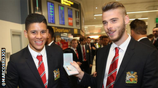 Manchester United players David De Gea (right) and Marcos Rojo.