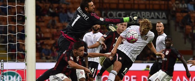 Oscar Hiljemark heads Palermo's first goal at Milan